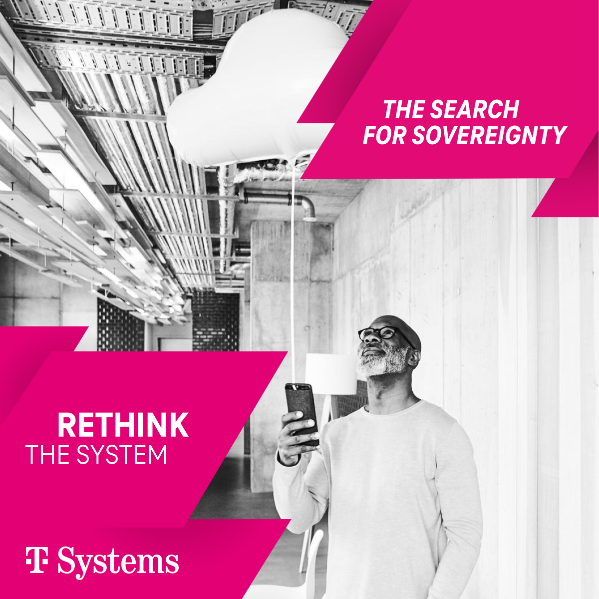 A T-Systems promotional image in black and white, featuring a man holding a smartphone and looking up at a stylised cloud suspended from the ceiling in a modern industrial setting. Bright pink geometric banners overlay the image, displaying the phrases “THE SEARCH FOR SOVEREIGNTY” and “RETHINK THE SYSTEM.” The T-Systems logo is positioned at the bottom left.